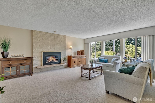 1728 N James St, Tacoma, WA 98406 - carpeted living room featuring a textured ceiling and a fireplace