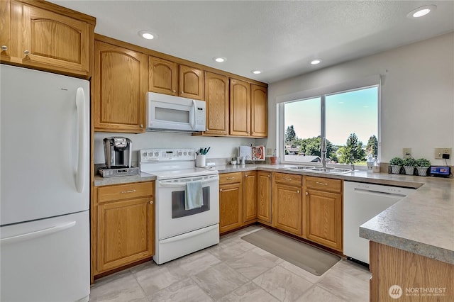 1728 N James St, Tacoma, WA 98406 - kitchen with white appliances, recessed lighting, light countertops, and brown cabinetry