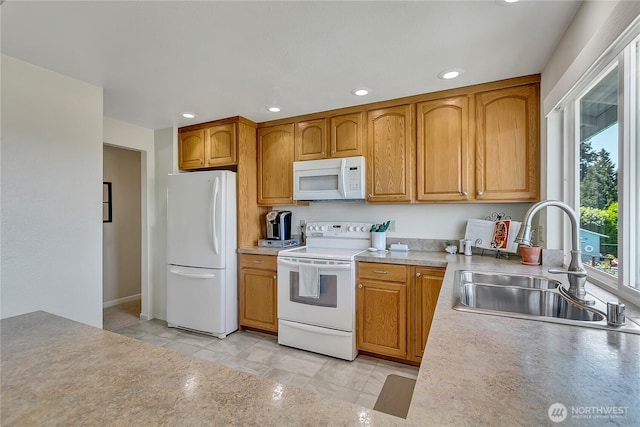 1728 N James St, Tacoma, WA 98406 - kitchen featuring white appliances, recessed lighting, light countertops, and brown cabinetry