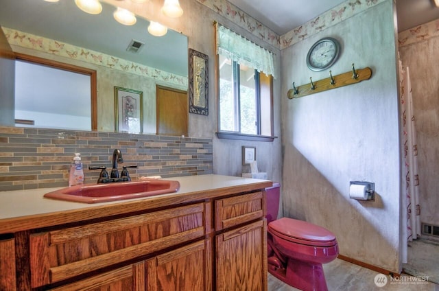 13273 W Cloquallum Rd, Elma, WA 98541 - bathroom with vanity and decorative backsplash
