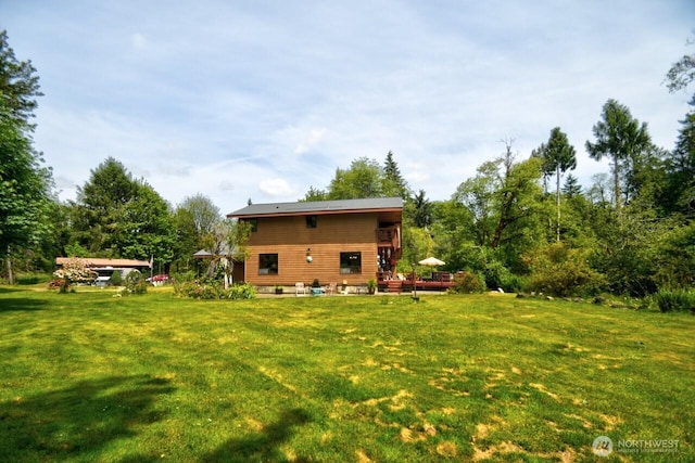 13273 W Cloquallum Rd, Elma, WA 98541 - back of house featuring a yard