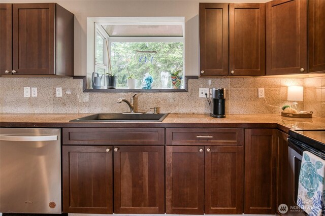 755 Island Cir SE, Ocean Shores, WA 98569 - kitchen featuring stainless steel appliances, decorative backsplash, and light countertops