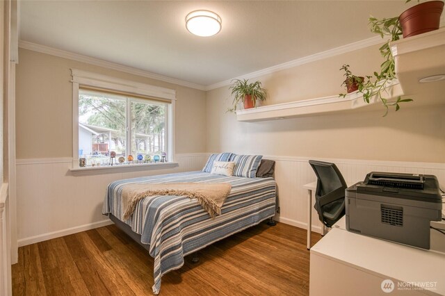 755 Island Cir SE, Ocean Shores, WA 98569 - bedroom with a wainscoted wall, wood finished floors, and crown molding