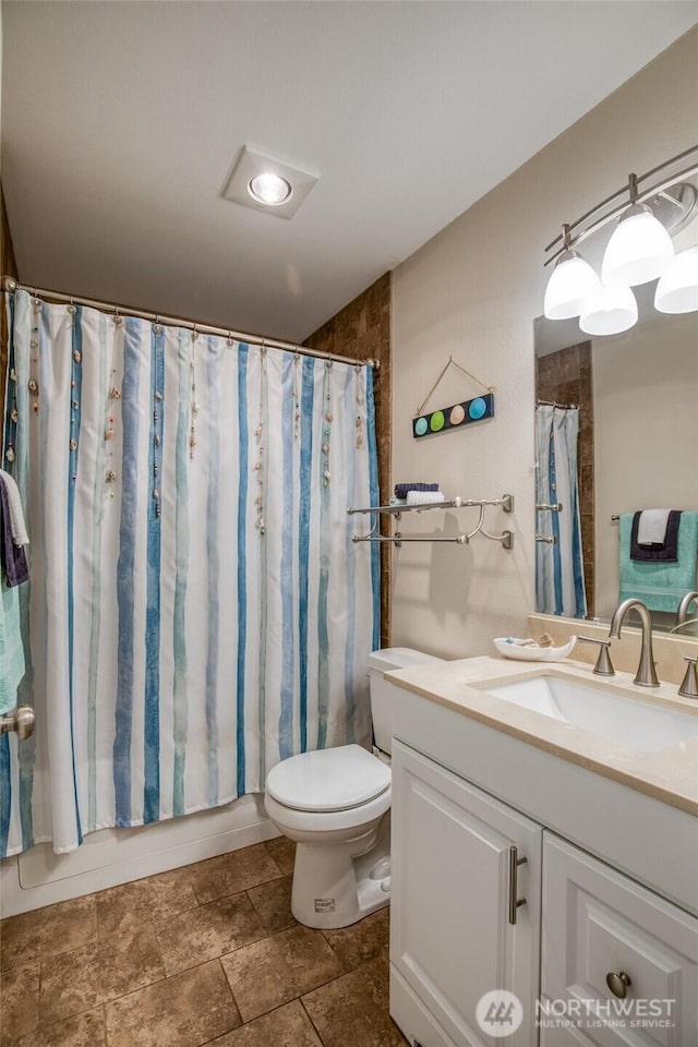 755 Island Cir SE, Ocean Shores, WA 98569 - bathroom with vanity and a shower with shower curtain