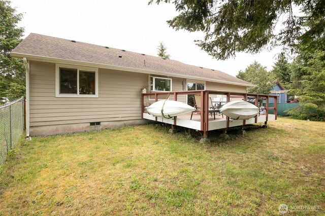 755 Island Cir SE, Ocean Shores, WA 98569 - back of house with a deck and a shingled roof