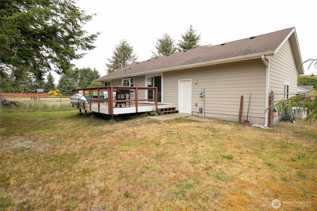 755 Island Cir SE, Ocean Shores, WA 98569 - rear view of house featuring a wooden deck
