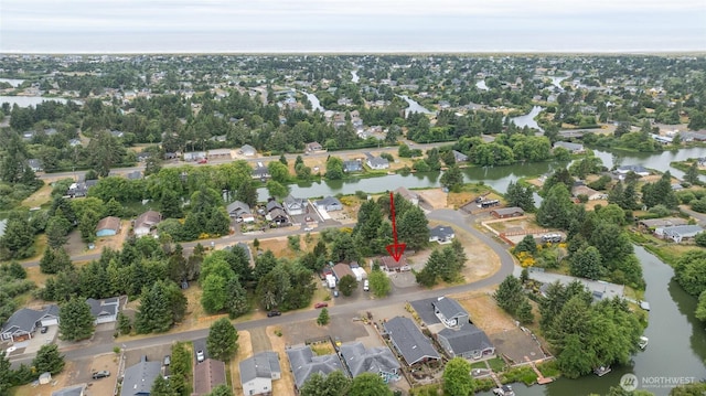 755 Island Cir SE, Ocean Shores, WA 98569 - aerial view of property's location with a nearby body of water and nearby suburban area