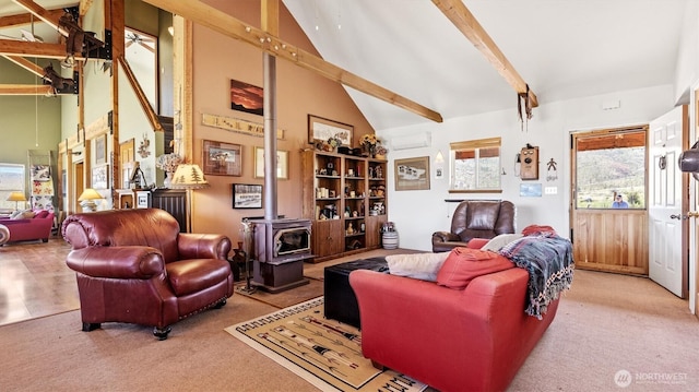 767 Bill Shaw Rd, Pateros, WA 98846 - living area with a wood stove, high vaulted ceiling, beam ceiling, and carpet floors