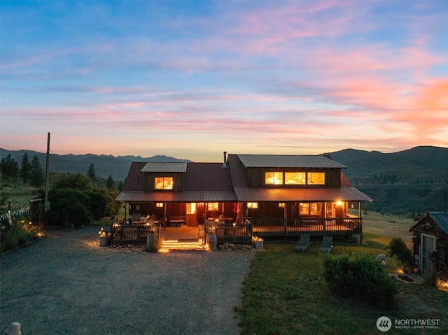 767 Bill Shaw Rd, Pateros, WA 98846 - chalet / cabin with a porch, a mountain view, and a metal roof