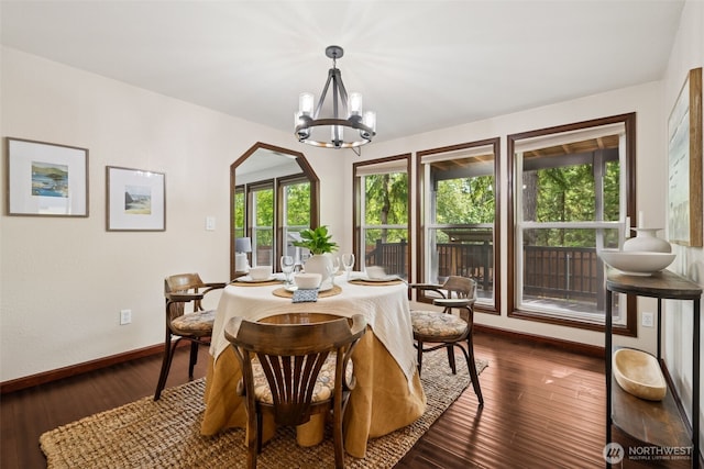 8037 Incline Dr SE, Olympia, WA 98513 - dining area with a chandelier and dark wood-style flooring