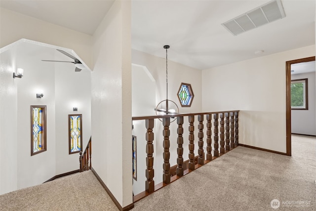 8037 Incline Dr SE, Olympia, WA 98513 - hallway featuring carpet flooring and an upstairs landing