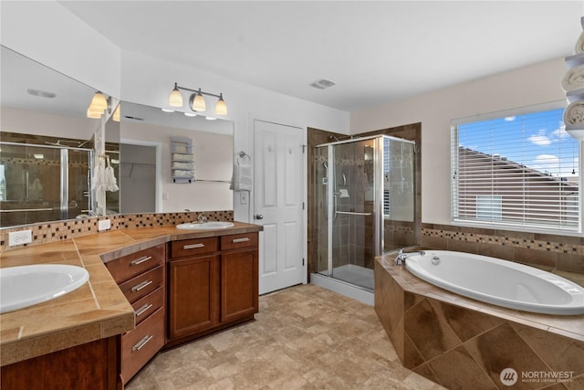 18328 73rd Avenue Ct E, Puyallup, WA 98375 - full bath featuring double vanity, a shower stall, a bath, and a closet
