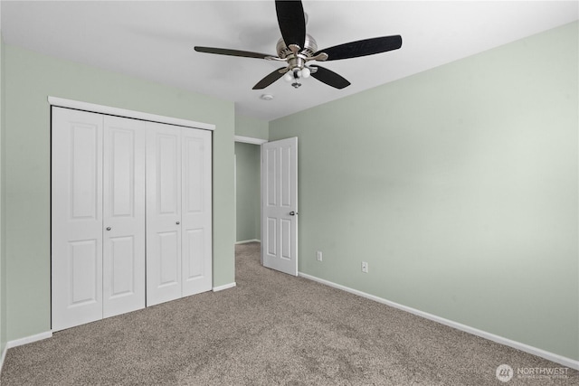 18328 73rd Avenue Ct E, Puyallup, WA 98375 - unfurnished bedroom featuring carpet flooring, a closet, and a ceiling fan