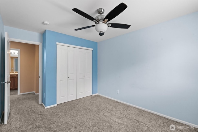 18328 73rd Avenue Ct E, Puyallup, WA 98375 - unfurnished bedroom featuring carpet, a closet, and a ceiling fan