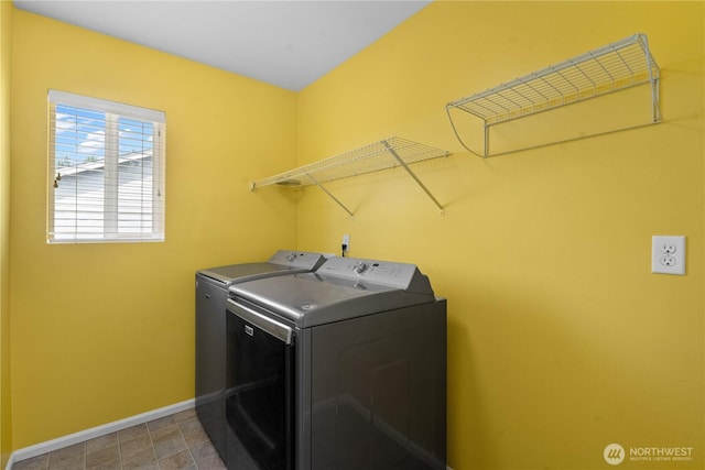 18328 73rd Avenue Ct E, Puyallup, WA 98375 - washroom featuring washer and dryer and baseboards