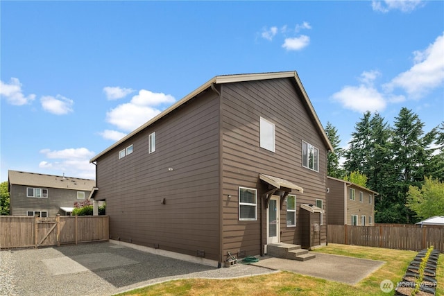 18328 73rd Avenue Ct E, Puyallup, WA 98375 - view of home's exterior with a patio, crawl space, and a gate