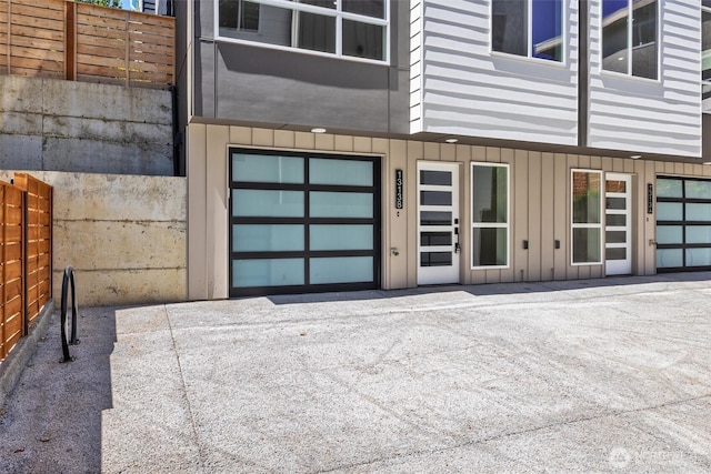 1313 14th Ave S Unit B, Seattle, WA 98144 - entrance to property with a garage and board and batten siding