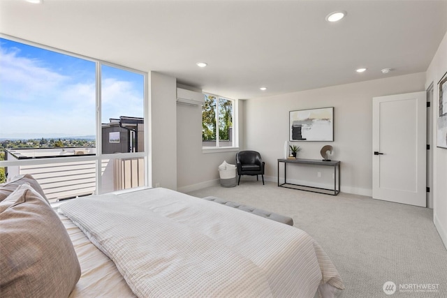 1313 14th Ave S Unit B, Seattle, WA 98144 - bedroom featuring an AC wall unit, light colored carpet, and recessed lighting