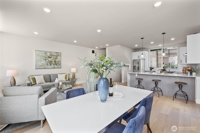 1313 14th Ave S Unit B, Seattle, WA 98144 - dining area with light wood finished floors and recessed lighting