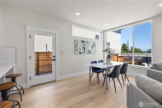 1313 14th Ave S Unit B, Seattle, WA 98144 - dining space with light wood finished floors and recessed lighting
