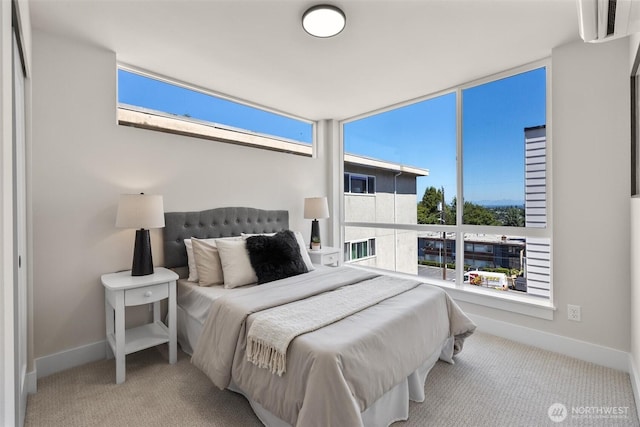 1313 14th Ave S Unit B, Seattle, WA 98144 - bedroom featuring carpet flooring and a wall mounted air conditioner