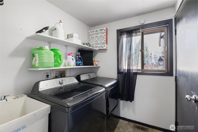 9307 Albert Way SE, Moses Lake, WA 98837 - laundry room with separate washer and dryer and baseboards