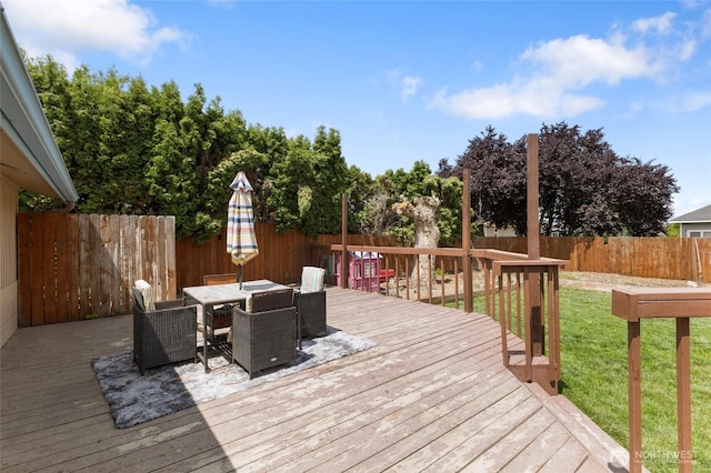 9307 Albert Way SE, Moses Lake, WA 98837 - wooden terrace featuring a fenced backyard and outdoor dining area