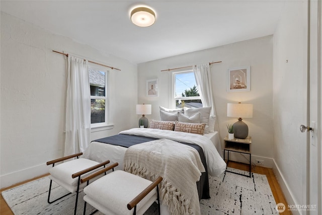 4335 Fawcett Ave, Tacoma, WA 98418 - bedroom featuring light wood-style flooring and baseboards