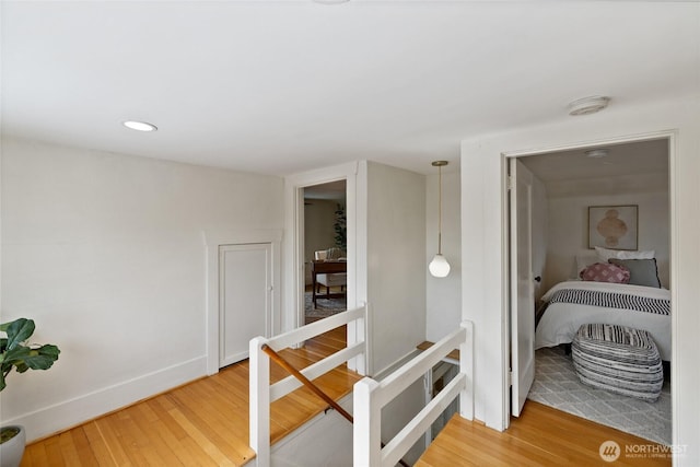 4335 Fawcett Ave, Tacoma, WA 98418 - hallway with an upstairs landing and wood finished floors