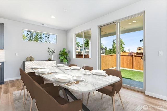 13936 178th St E Unit 85, Puyallup, WA 98374 - dining space with light wood-style floors and recessed lighting