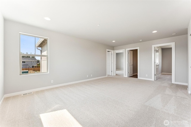 13936 178th St E Unit 85, Puyallup, WA 98374 - unfurnished bedroom featuring light colored carpet and recessed lighting