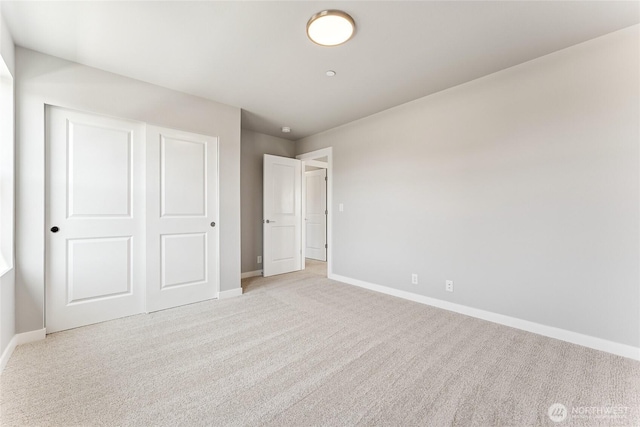 13936 178th St E Unit 85, Puyallup, WA 98374 - unfurnished bedroom with light colored carpet and a closet