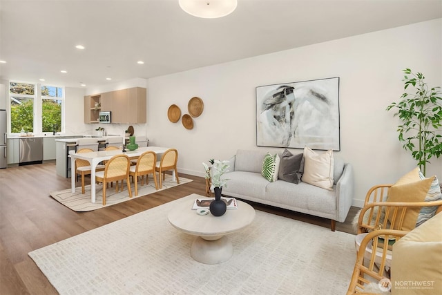 1615 N 50th St Unit A, Seattle, WA 98103 - living area featuring light wood-style flooring and recessed lighting