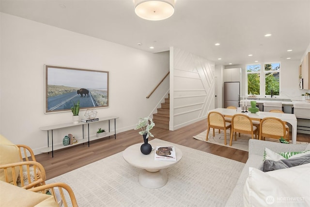 1615 N 50th St Unit A, Seattle, WA 98103 - living room with stairs, light wood-style floors, and recessed lighting