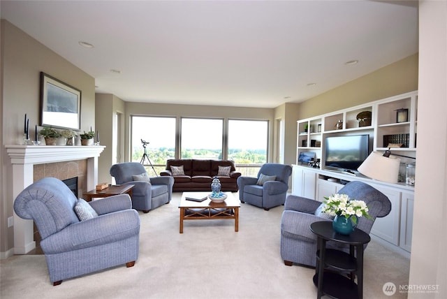 771 Brigadoon Blvd, Sequim, WA 98382 - living room featuring light carpet and a tiled fireplace