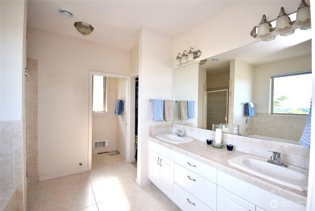 771 Brigadoon Blvd, Sequim, WA 98382 - bathroom with a shower stall, tile patterned flooring, double vanity, and a bathtub