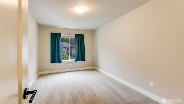 23000 SE Sycamore St, Black Diamond, WA 98010 - unfurnished room featuring baseboards and carpet floors