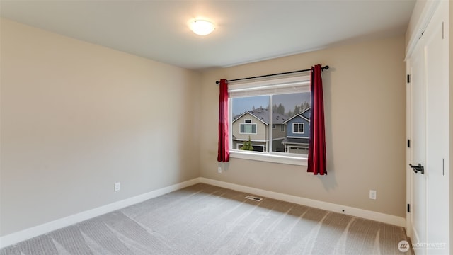 23000 SE Sycamore St, Black Diamond, WA 98010 - carpeted spare room featuring baseboards