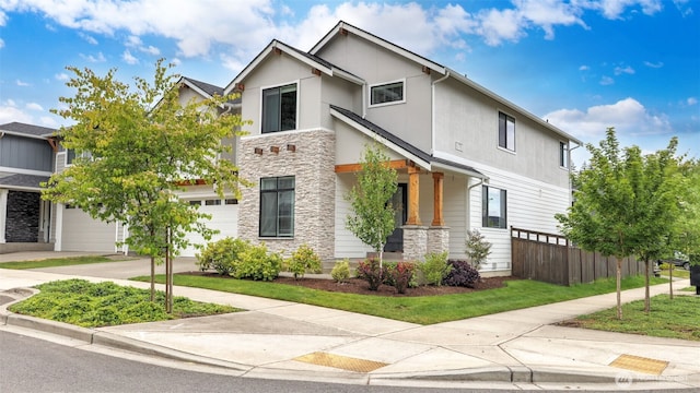 23000 SE Sycamore St, Black Diamond, WA 98010 - contemporary house featuring stone siding, a garage, driveway, and stucco siding
