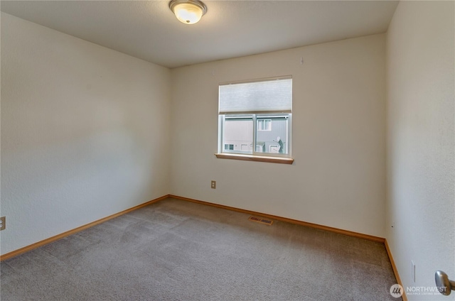 4101 Alabaster St SE, Lacey, WA 98503 - carpeted empty room featuring baseboards