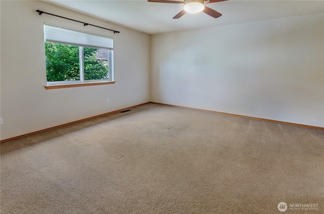 4101 Alabaster St SE, Lacey, WA 98503 - carpeted empty room featuring a ceiling fan and baseboards