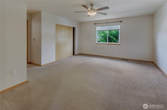 4101 Alabaster St SE, Lacey, WA 98503 - unfurnished room with light carpet and ceiling fan
