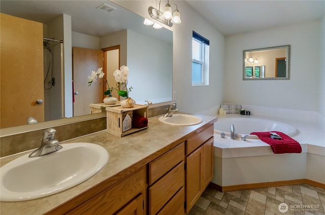 4101 Alabaster St SE, Lacey, WA 98503 - bathroom featuring a garden tub, double vanity, and a shower