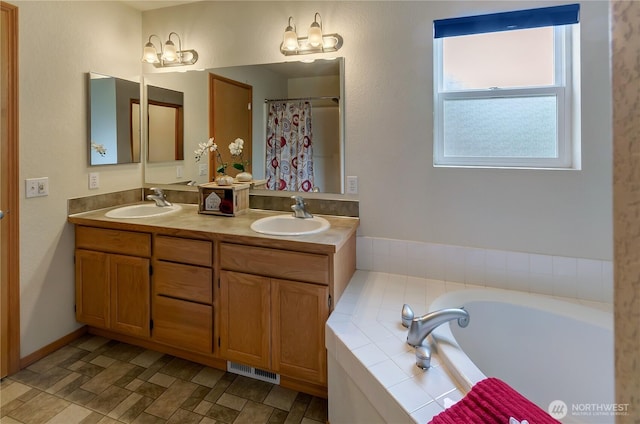 4101 Alabaster St SE, Lacey, WA 98503 - bathroom featuring a bath, double vanity, a chandelier, and a shower with curtain