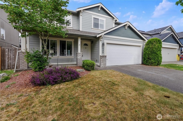 4101 Alabaster St SE, Lacey, WA 98503 - view of front of property featuring asphalt driveway and a garage