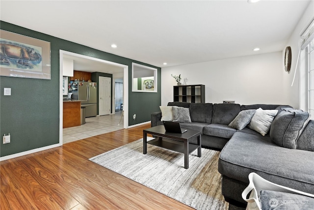 19031 SE 266th St, Covington, WA 98042 - living room featuring light wood-style flooring and recessed lighting