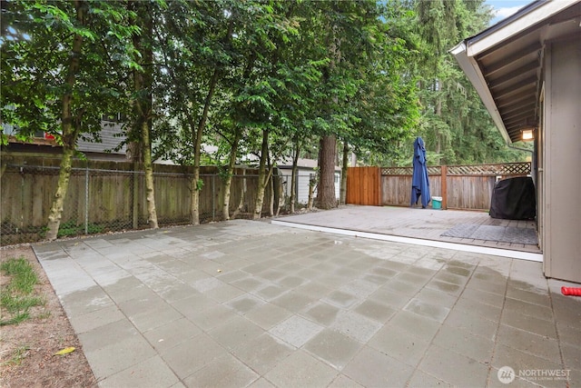 19031 SE 266th St, Covington, WA 98042 - fenced backyard featuring a patio and a grill