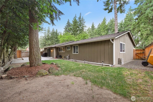 19031 SE 266th St, Covington, WA 98042 - rear view of property featuring a patio area and board and batten siding