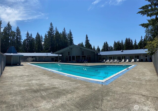 19031 SE 266th St, Covington, WA 98042 - community pool featuring a patio
