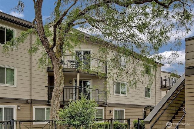 15819 NE Leary Way Unit D302, Redmond, WA 98052 - view of building exterior featuring stairs